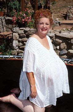 RM HJHY6C – Obese woman wearing a bikini and sunbathing on the beach. . Fat naked granny